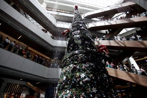 In Santiago malls, they build big Christmas trees and they even add artificial snow.